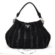 Buy Prada Black Shoulder Bag Leather and nylon at the right price at LabelLOV vintage webshop. Luxe, vintage, fashion. Safe and secure online shopping. Antwerp, Belgium.