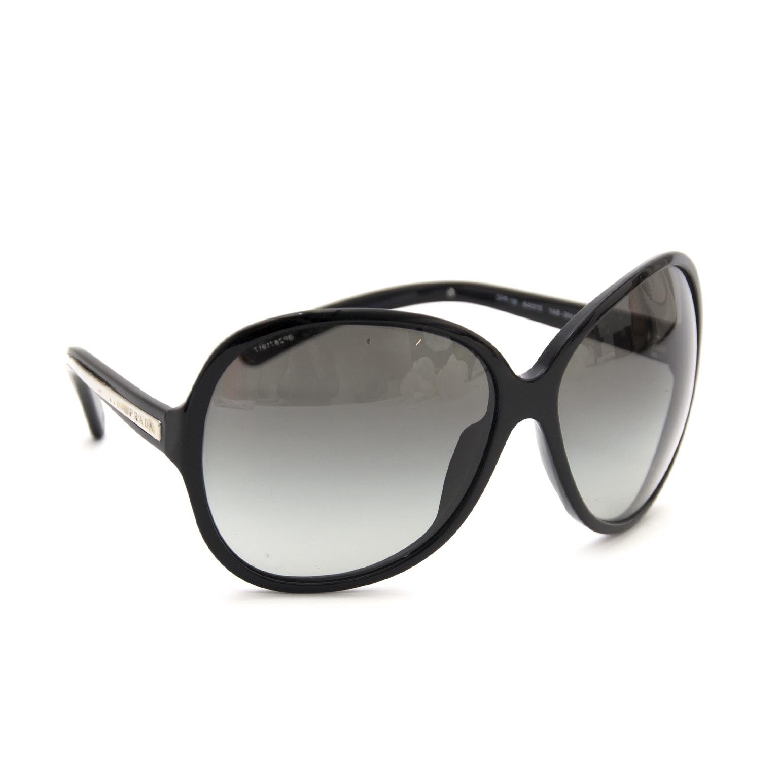 Prada black sunglasses now online for the best price at labellov.com