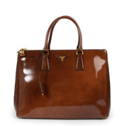 Shop now for your pre-loved, 100% authentic Prada Brown Patent Leather Large Galleria Top Handle Bag, at Labellov in Antwerp