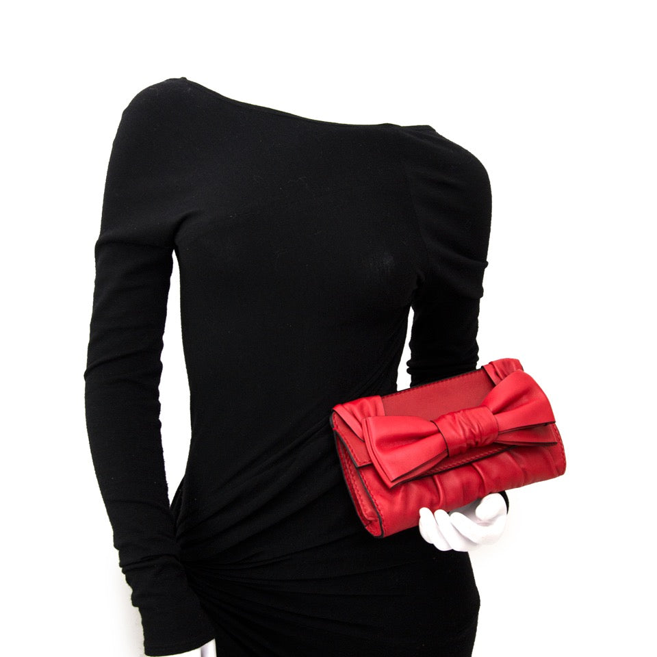 Valentino Leather Bow Clutch en cuir pour le meilleur prix rouge