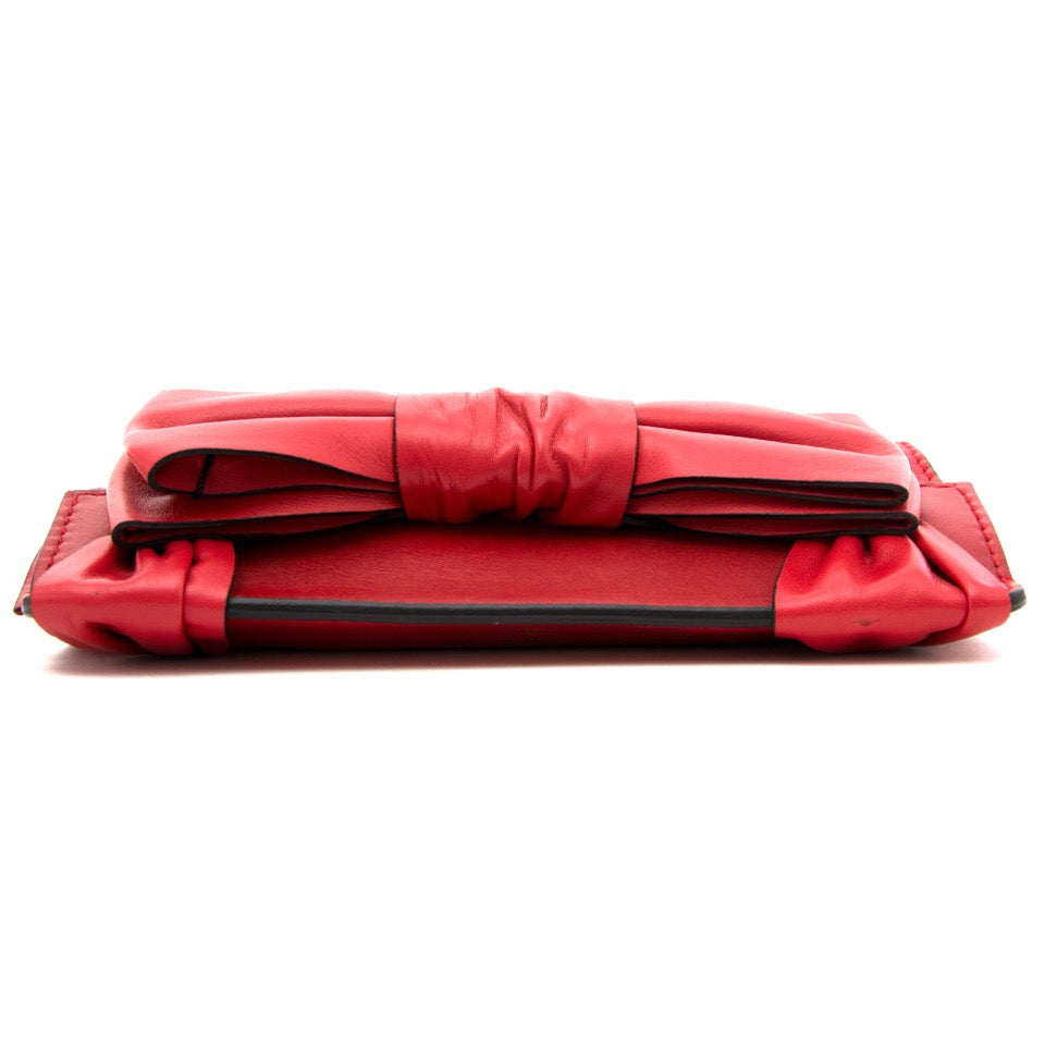 Koop Valentino Leather Bow Clutch for the best price online with worldwide shipping