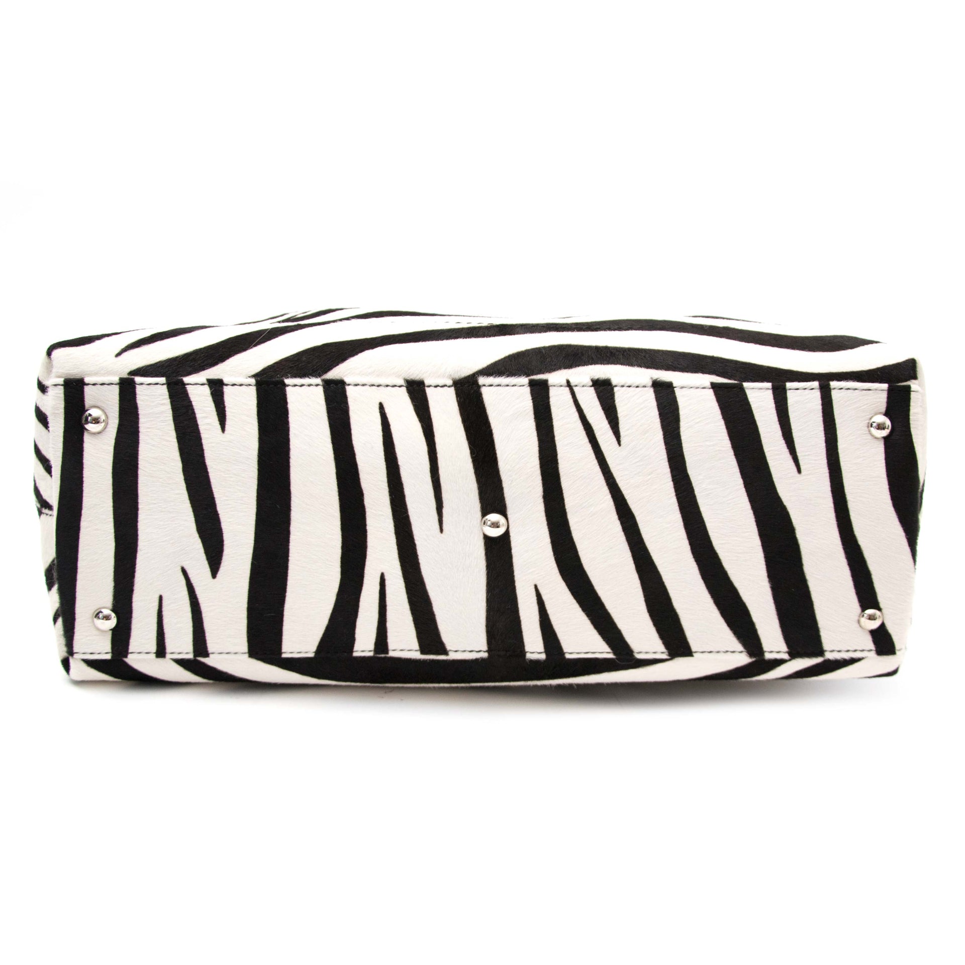 Are you interested in the authentic Salvatore Ferragamo 'W' Bag Zebra Pony Hair?
