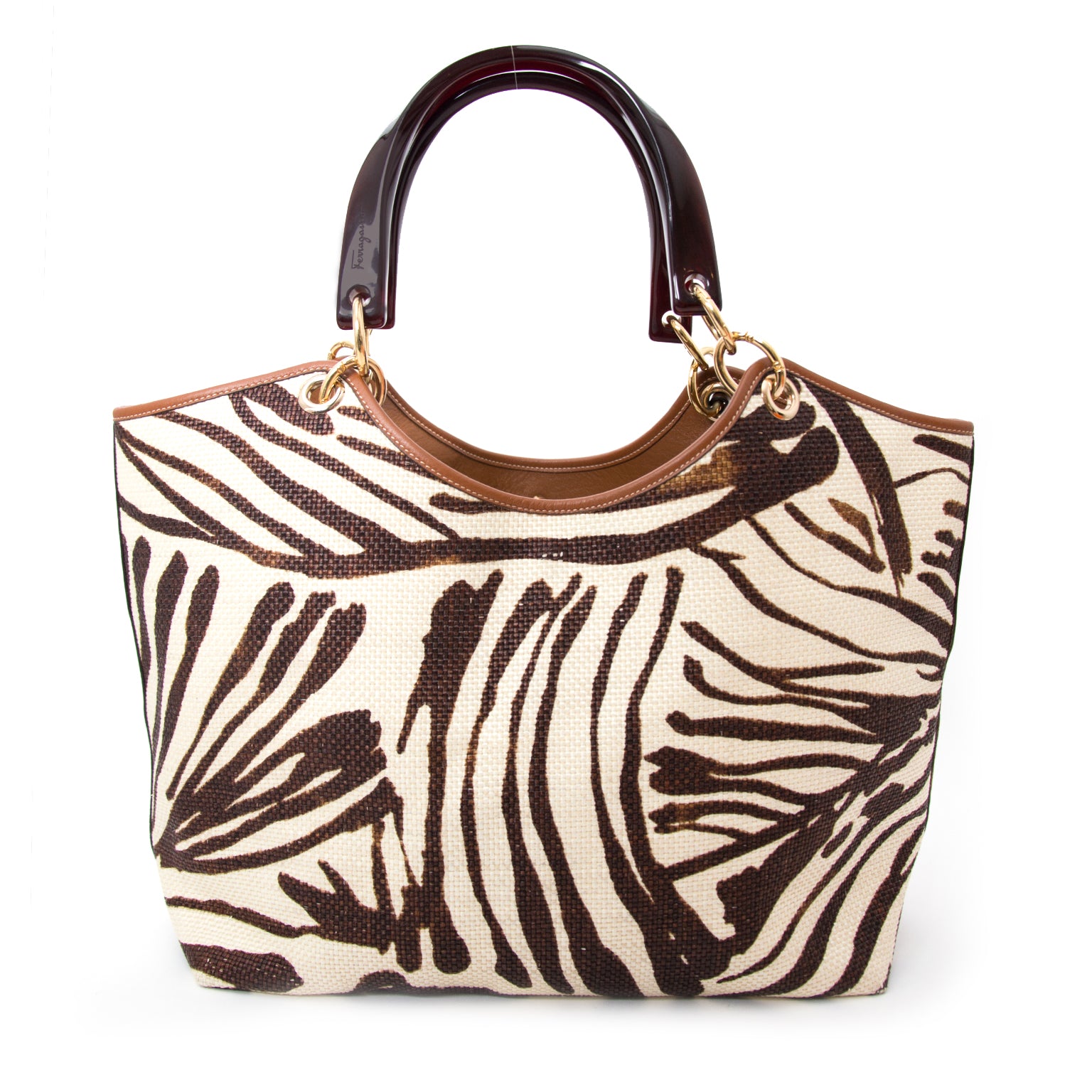 We buy and sell your secondhand designer items from the big brands such as Salvatore Ferragamo Animal Print Shopper