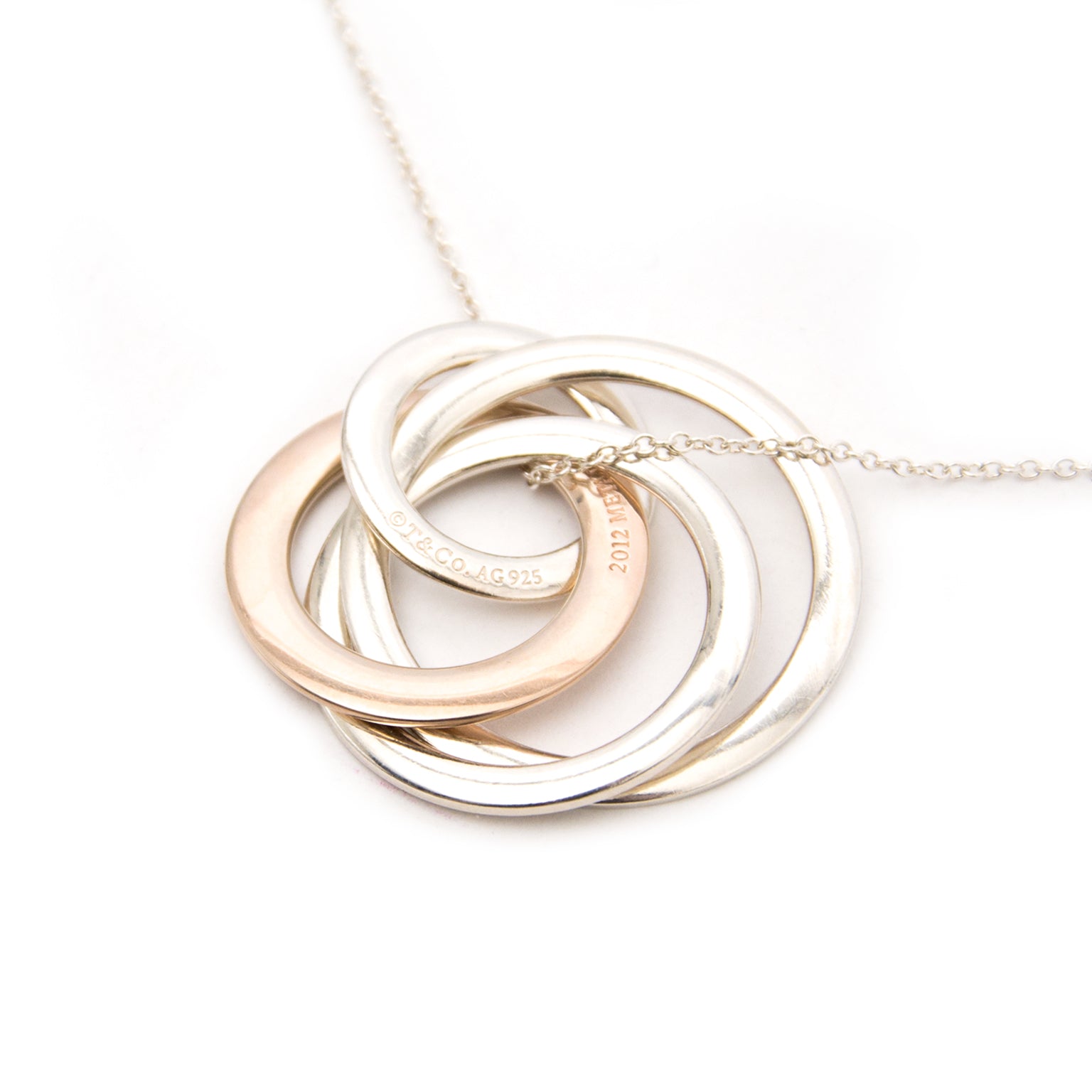 Tiffany & Co Interlocking Circles Pendant In Rubedo Metal And Sterling Silver now online at labellov.com at the best price.