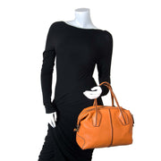Tod's D-Styling Convertible Bauletto Orange Leather Bag now for sale at labellov vintage fashion webshop belgium