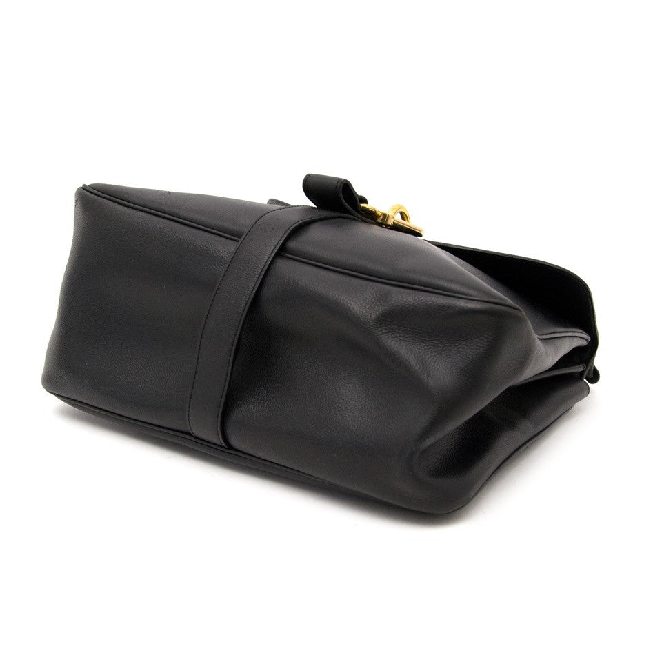 Vintage Delvaux 'Gin Fizz' black bag for the best price at Labellov webshop. Safe and secure online shopping with 100% authenticity. Vintage Delvaux 'Gin Fizz' noir sac à epaule pour le meilleur prix.