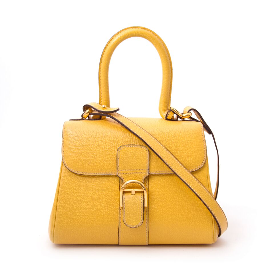 Delvaux Brillant Yellow Mini + Strap is now for sale in Antwerp Belgium www.labellov.com with worldwide shipping and at reasonable prices.