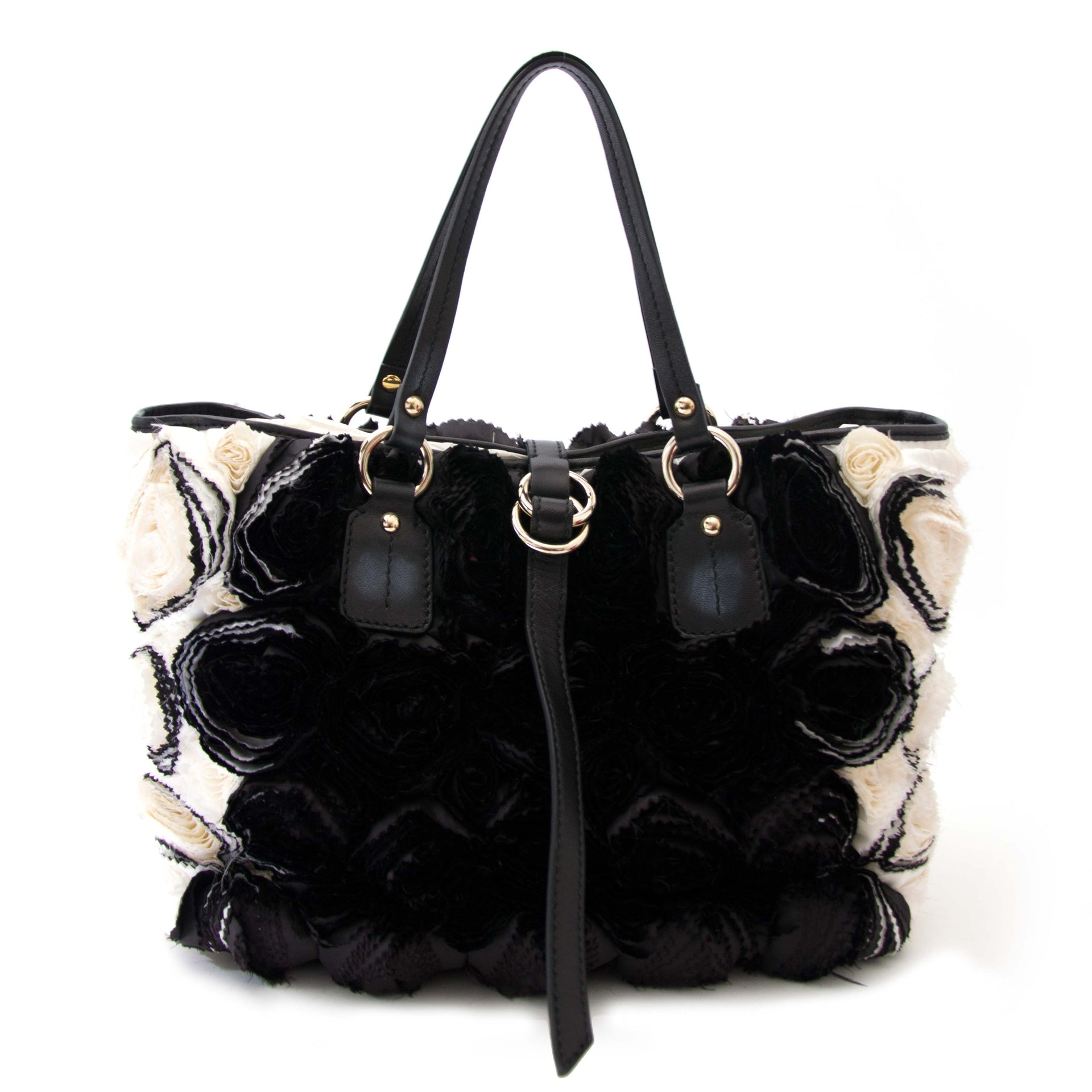Bent u op zoek naar een afgeprijsde en authentieke Valentino Rosette Black and White Shoulder Bag?
