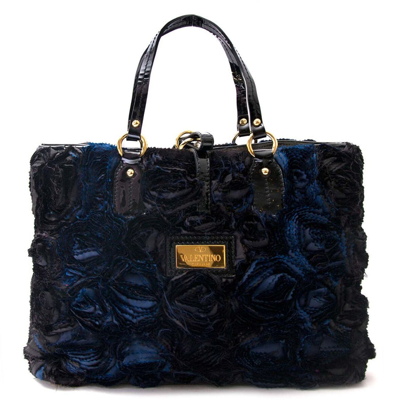 Buy an authentic secondhand Valentino bag in black blue at the right price at LabelLOV vintage webshop. Safe and secure online shopping.