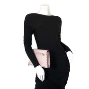 Valentino Pink Rockstud Clutch now for sale at labellov vintage fashion webshop belgium