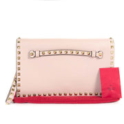Valentino Pink Rockstud Clutch now for sale at labellov vintage fashion webshop belgium