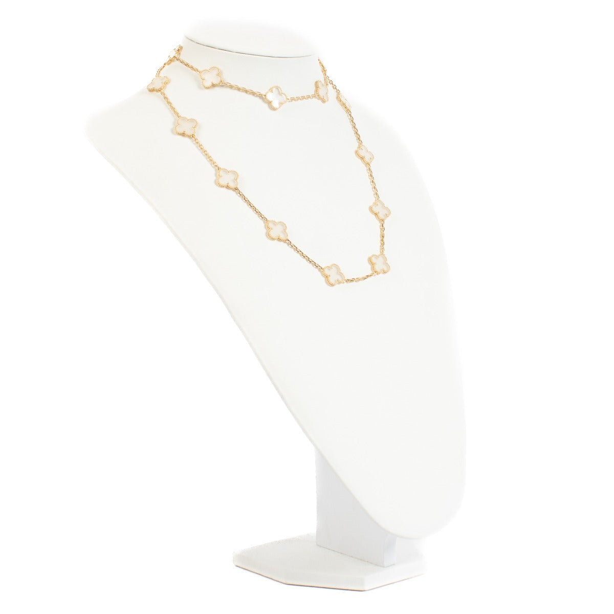 Collier long 20 motifs Vintage Alhambra Van Cleef & Arpels en cristal de roche et or jaune