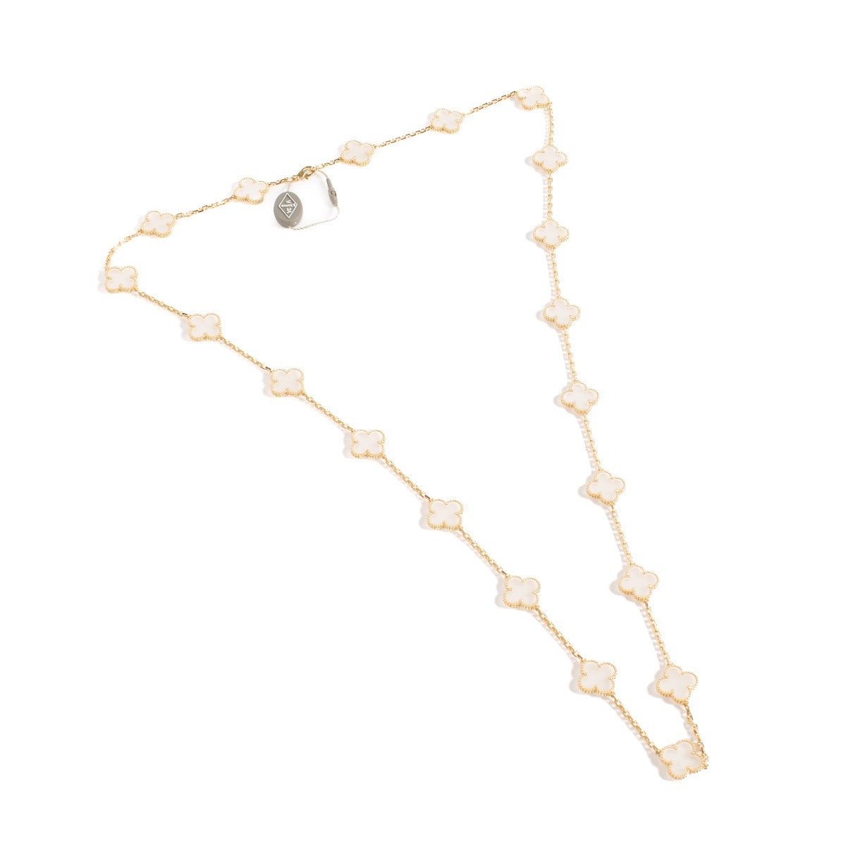 Collier long 20 motifs Vintage Alhambra Van Cleef & Arpels en cristal de roche et or jaune