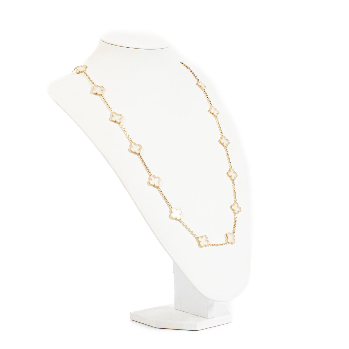 Collier long 20 motifs Vintage Alhambra Van Cleef & Arpels en cristal de roche et or jaune