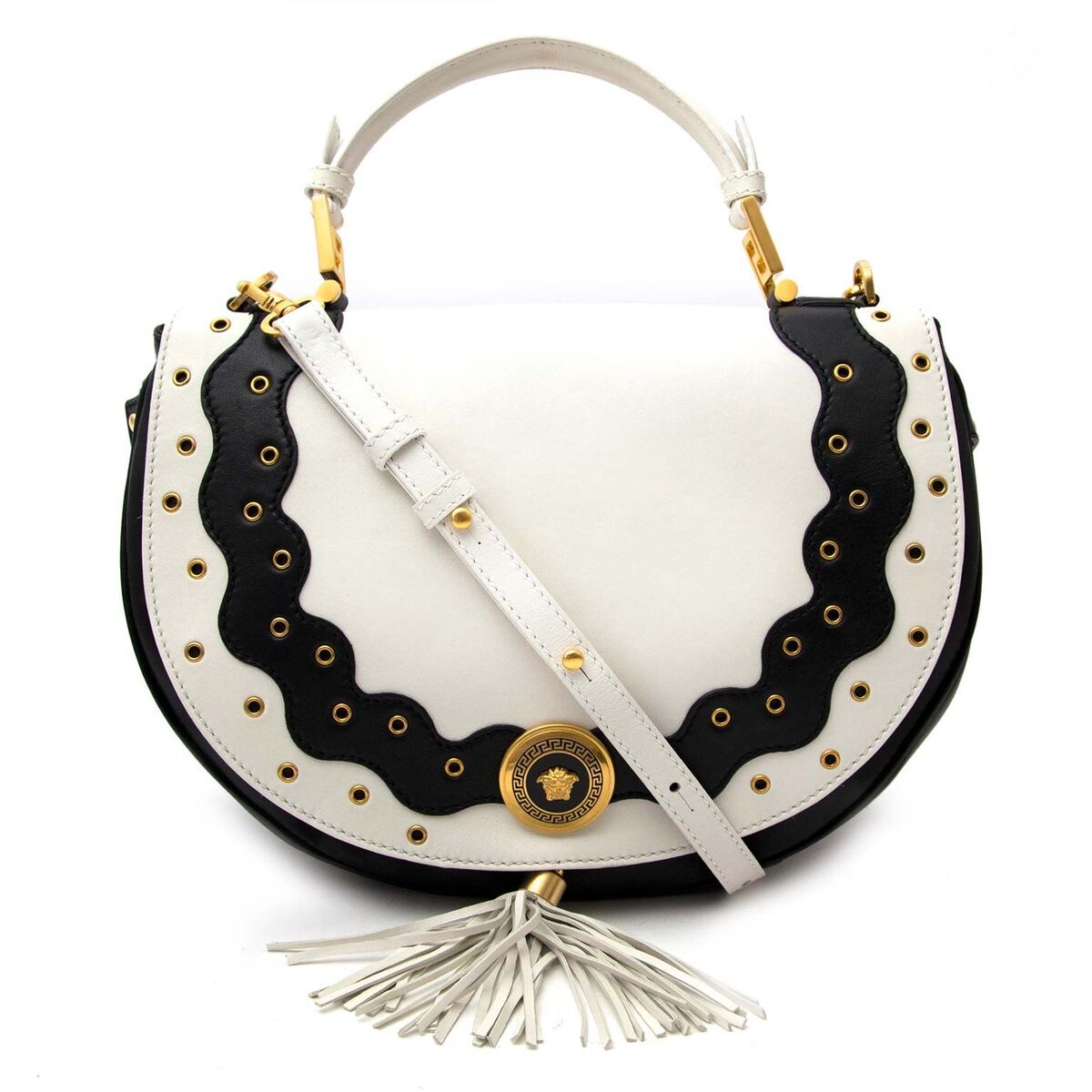 Buy an authentic secondhand Versace bag in a black and white leather at the right price at LabelLOV vintage webshop. Safe and secure online shopping.