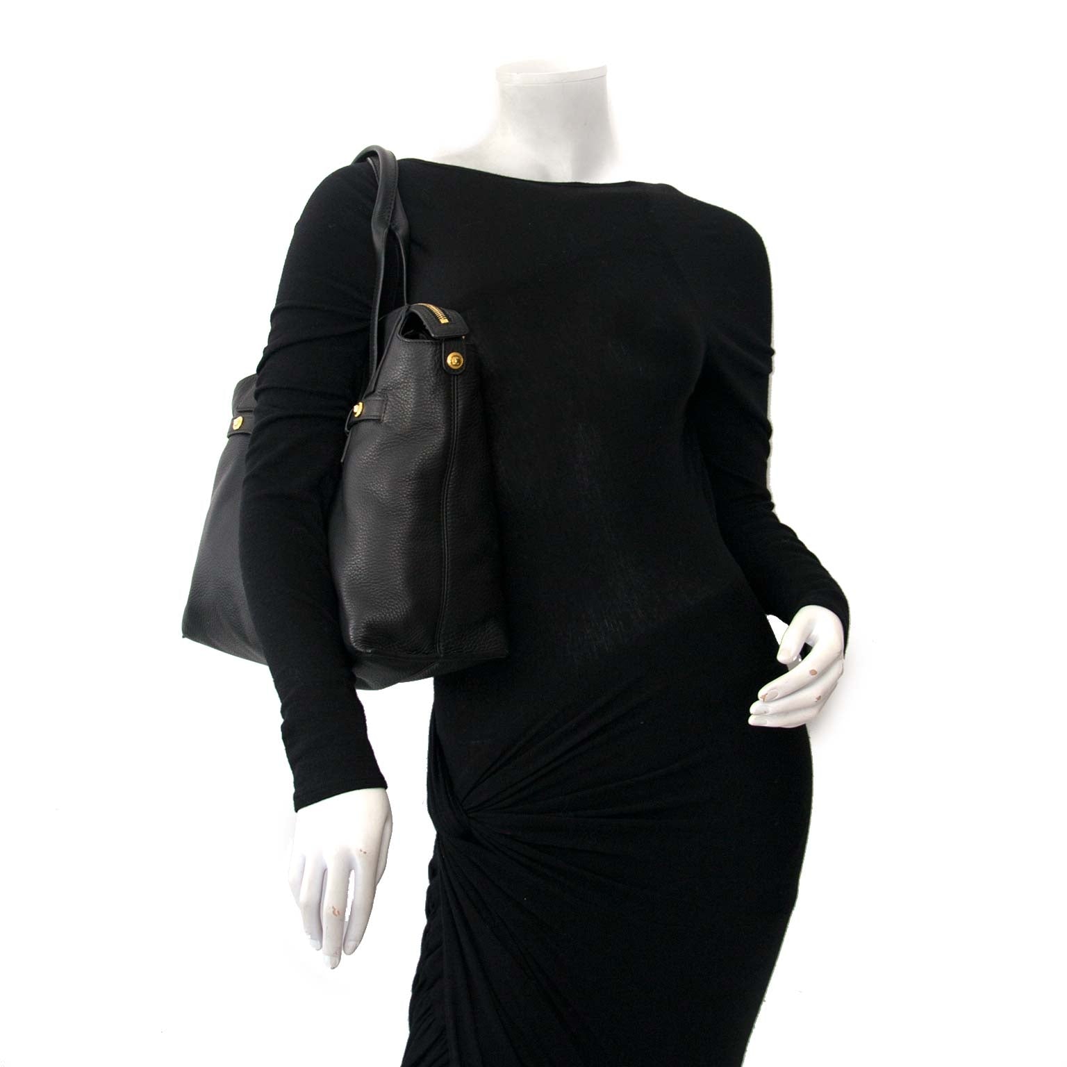 Buy preloved designer handbags such as Versace Black Pebbled Leather Medusa Shopping Tote