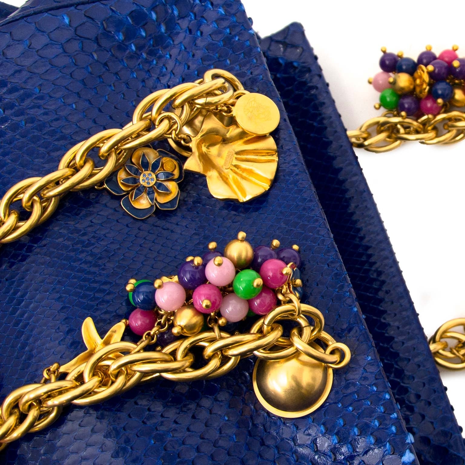 Labellov vintage fashion webshop belgium with versace python bags