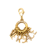 versace gold-toned earrings and charm set now for sale at labellov vintage fashion webshop belgium