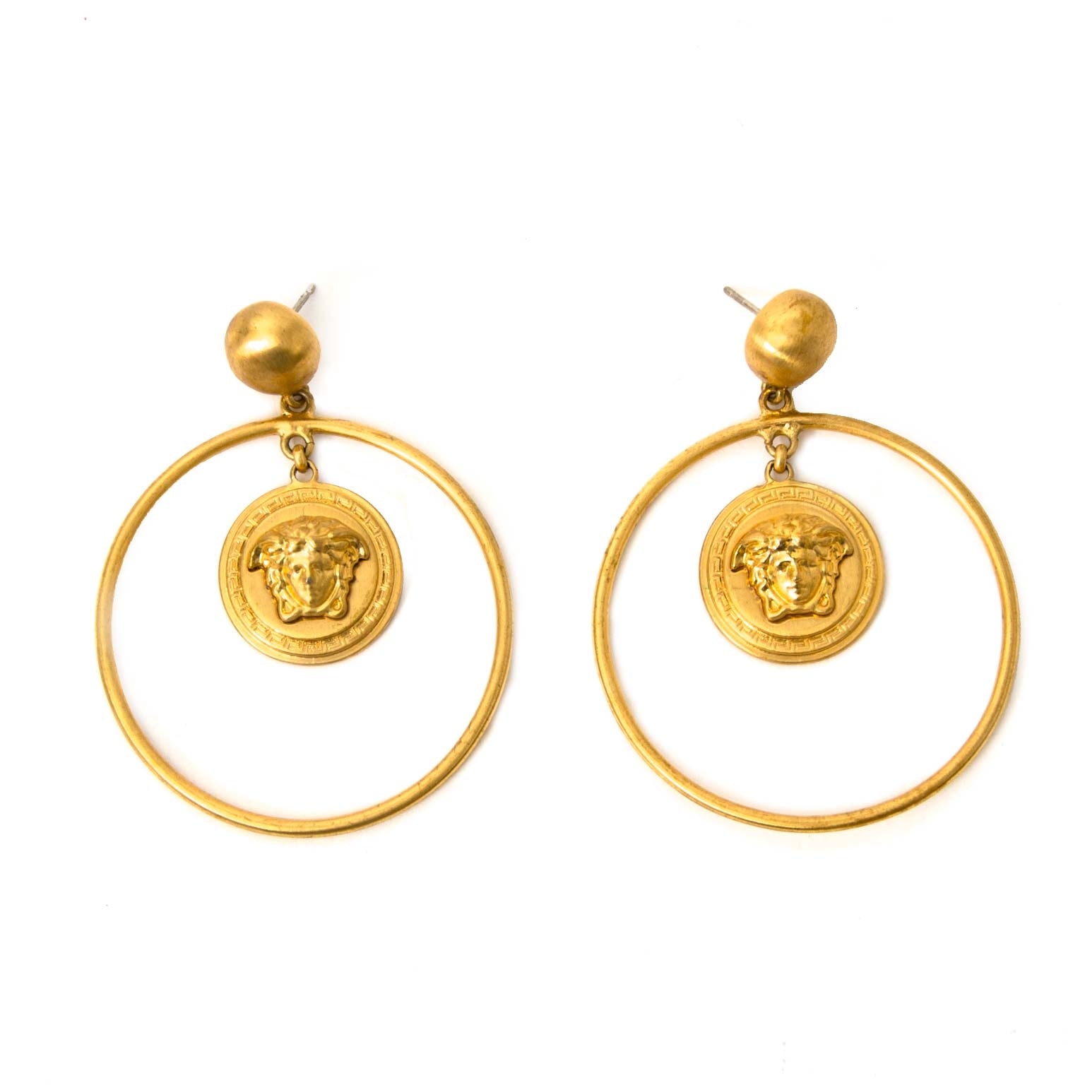 Buy and sell your Versace Gold Metal Medusa Hoop Earrings for the best price
