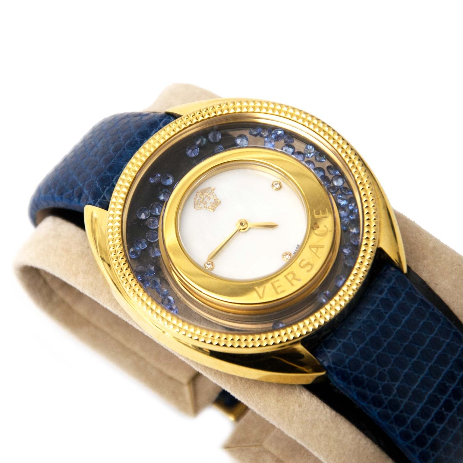acheter en ligne seconde main Red floating sapphires in transparent bezel