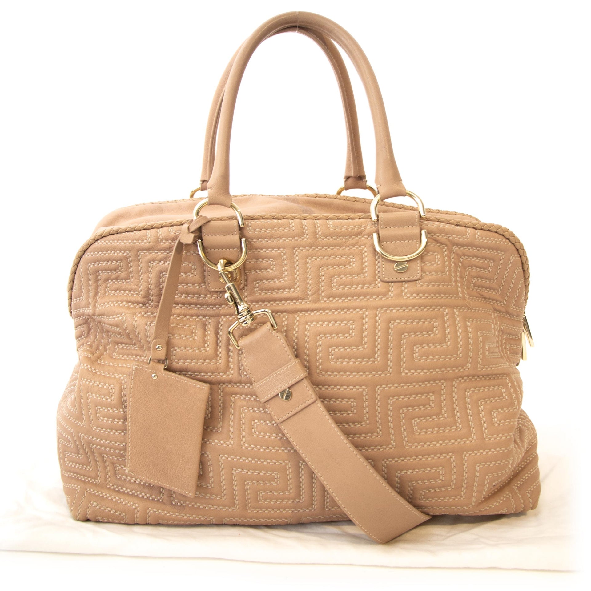 Vintage pink Versace crossbody handbag at Labellov. Safe online shopping