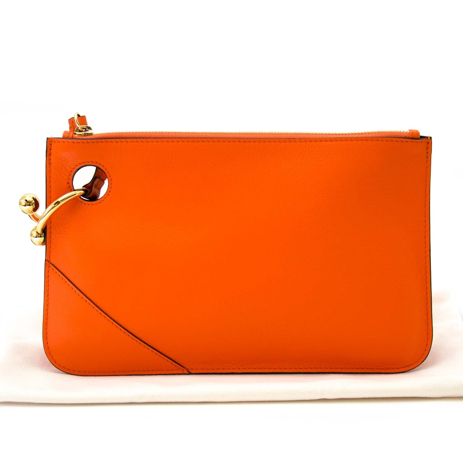 jw anderson tangerine pierce clutch now for sale at labellov vintage fashion webshop belgium