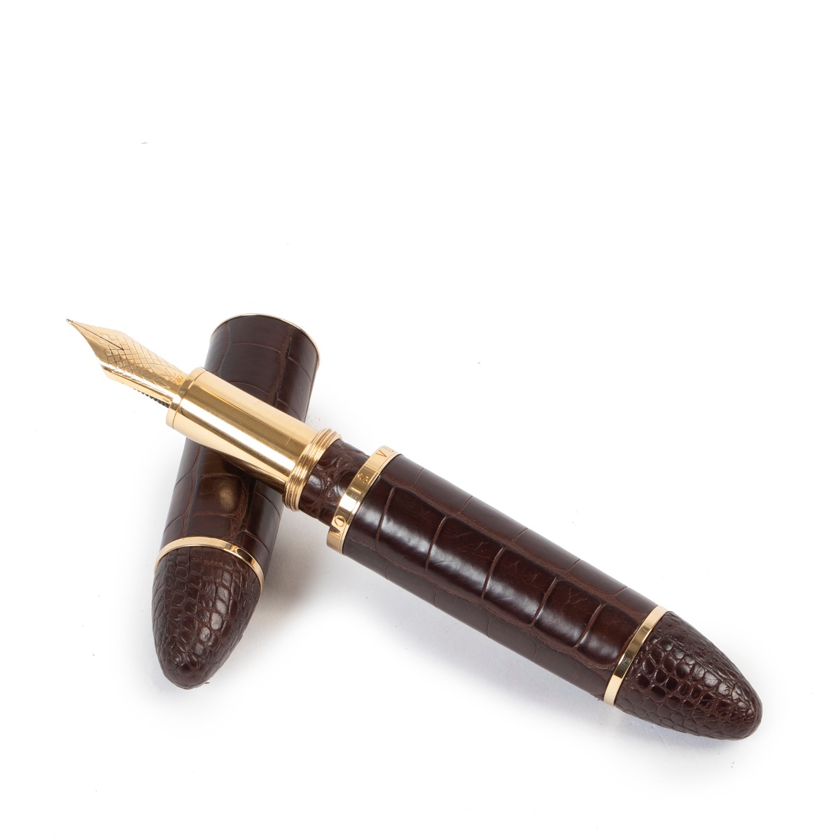 A Louis Vuitton Cargo Exotic brown leather fountain pen, gilt clip and  fittings, with an 18k gold ni