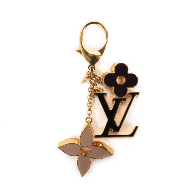 Louis Vuitton Gold Fleur De Monogram Charms Key Chain Golden Metal  ref.836284 - Joli Closet