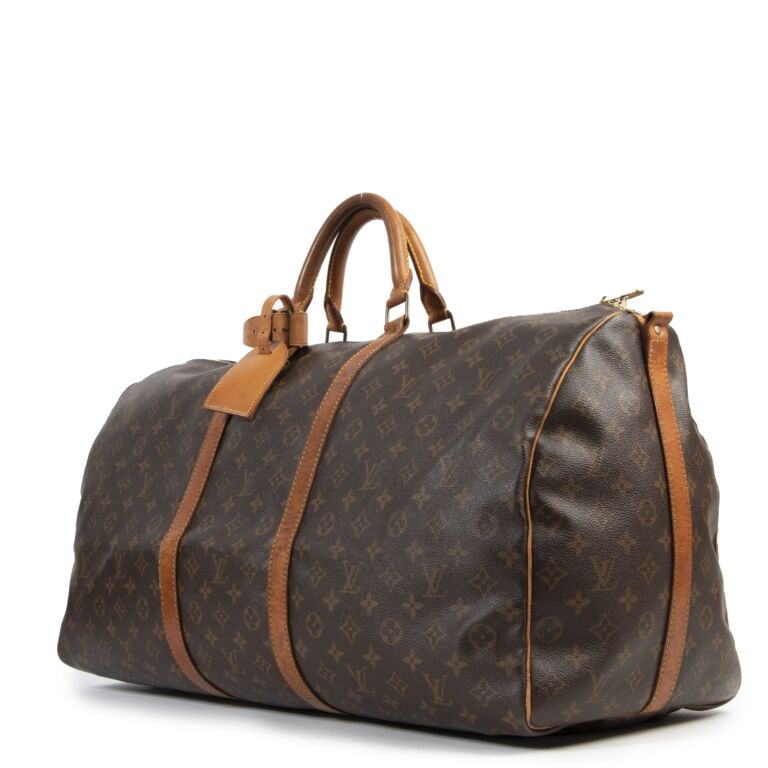 SOLD..Vintage Louis Vuitton monogram Keepall Bandoulière 60. Excellent  vintage condition. 23” wide x 12” tall. The perfect carryon bag!…