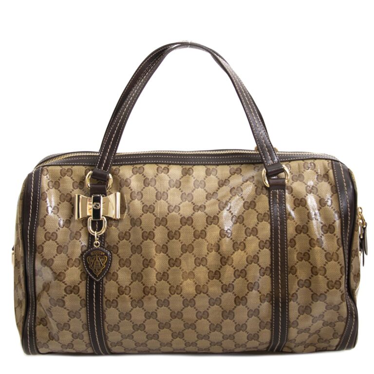 I am looking to buy a Gucci handbag replica. How can I reach you? - Quora