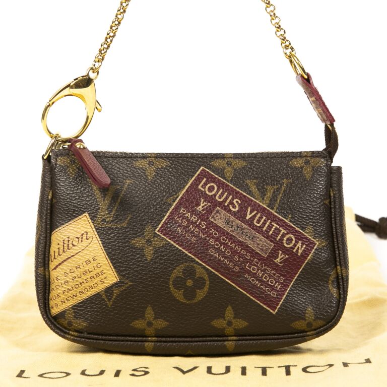 Louis Vuitton Monogram Stamp Canvas Mini Pochette Bag.  Luxury
