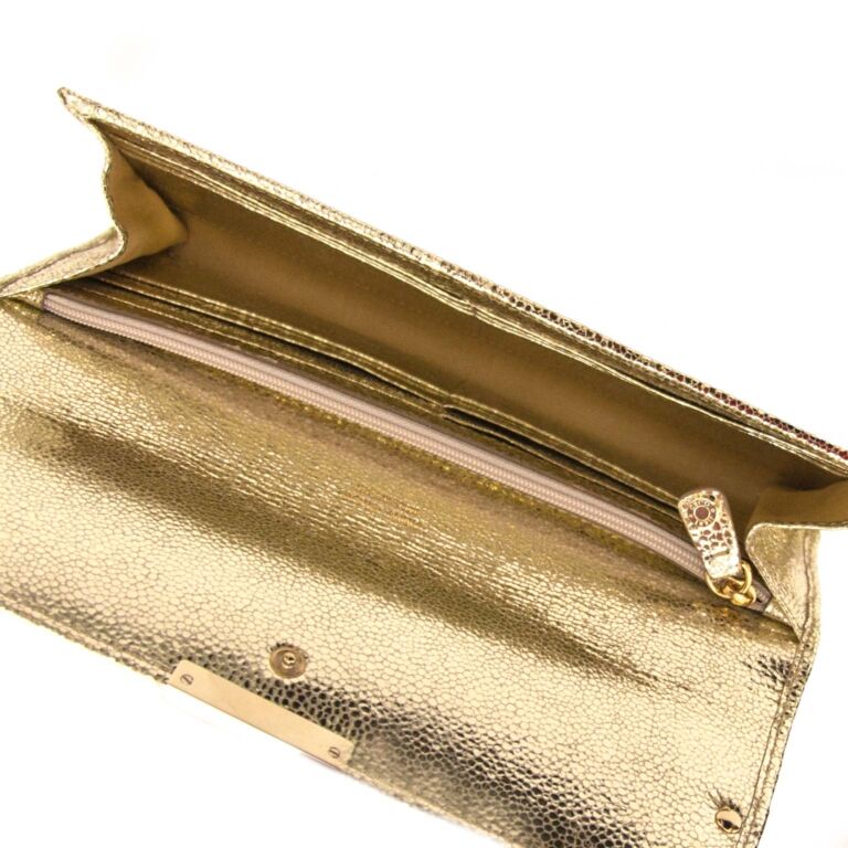 Louis Vuitton Clutch bags Golden Metallic Silk Cloth Python ref.125408 -  Joli Closet
