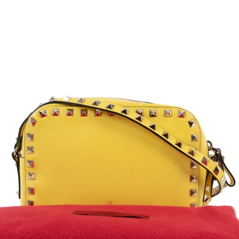 Rockstud Small Leather Crossbody Bag in Yellow - Valentino