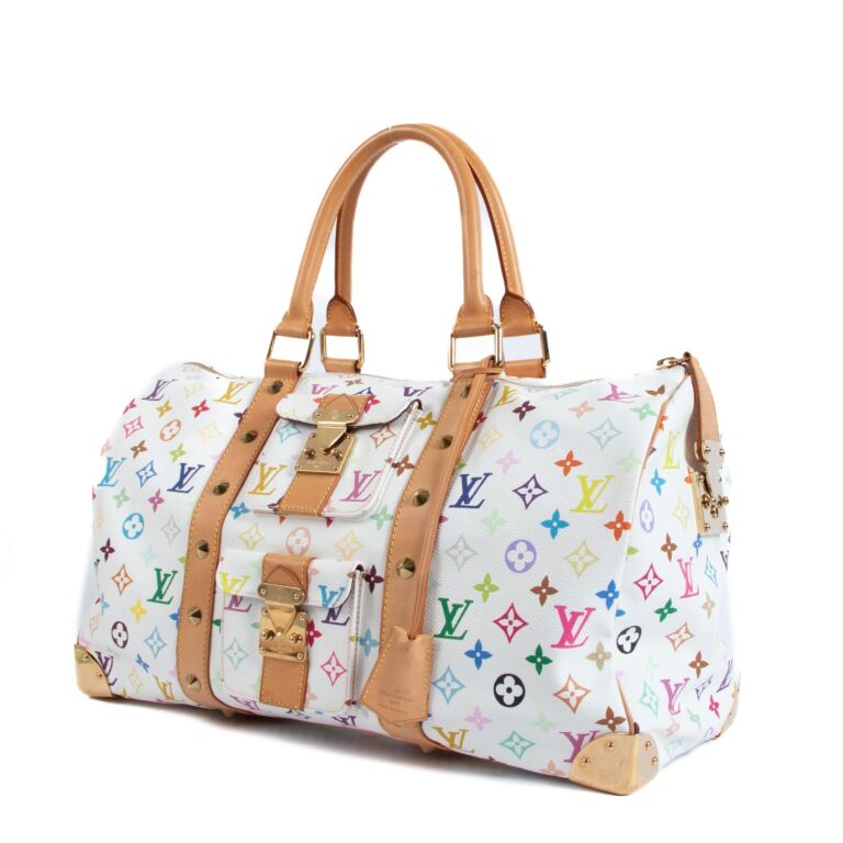 Add a pop of color to your travel outfit with this LV Keepall 45