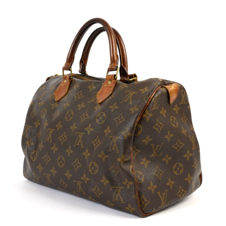 EXTREMELY RARE LOUIS VUITTON GOLD PERRIER MONOGRAM FASCINATION