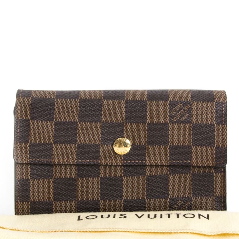 Alexandra leather wallet Louis Vuitton Brown in Leather - 20737107