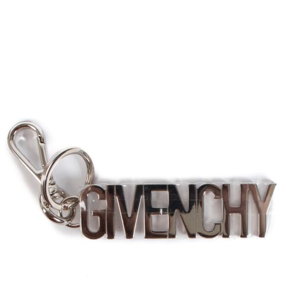 shop authentic second hand Givenchy Silver Logo Key Charm on Labellov.com