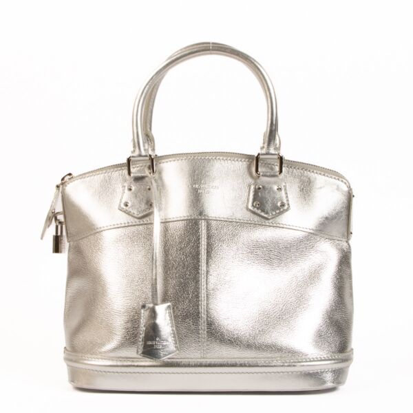 Shop 100% authentic second-hand Louis Vuitton Silver Suhali Lockit Bag on Labellov.com