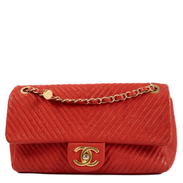 shop 100% authentic second hand Chanel Red Chevron Wrinkled Goatskin Medallion Flap Bag on Labellov.com