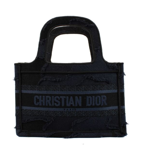 Shop safe online at Labellov in Antwerp, Brussels and Knokke this 100% authentic second hand Christian Dior Navy Blue Mini Book Tote Bag