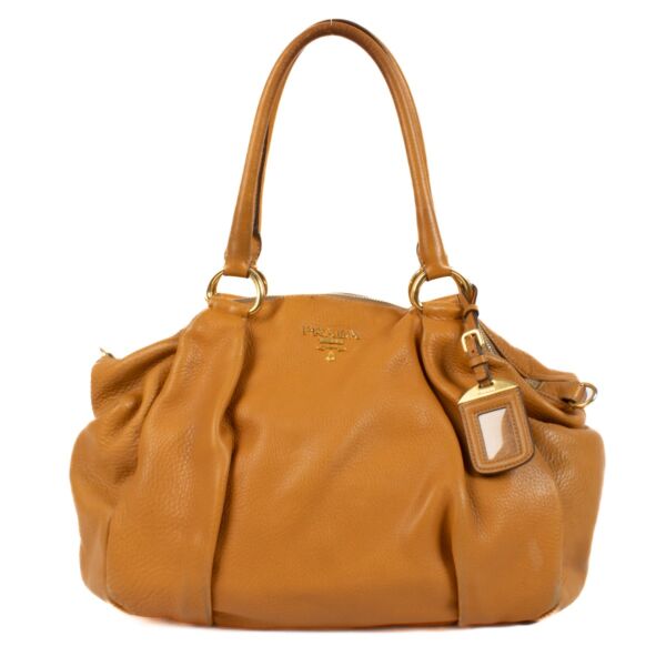 Shop 100% authentic Prada Ambra Bauletto Top Handle Bag at Labellov.com.