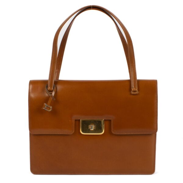 Shop safe online at Labellov in Antwerp, Brussels and Knokke this 100% authentic second hand Delvaux Camel Box Calf Vintage Bag