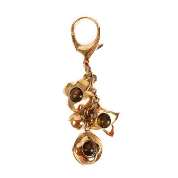 Shop safe online at Labellov in Antwerp en Knokke this 100% athentic second hand Louis Vuitton Gold Tresor Bag Charm
