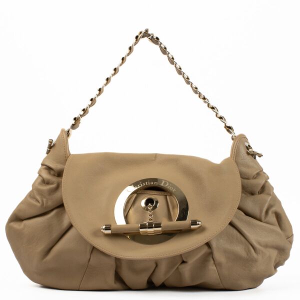Shop safe online at Labellov in Antwerp, Brussels and Knokke this 100% authentic second hand Christian Dior Beige Leather Jazz Club Shoulder Bag