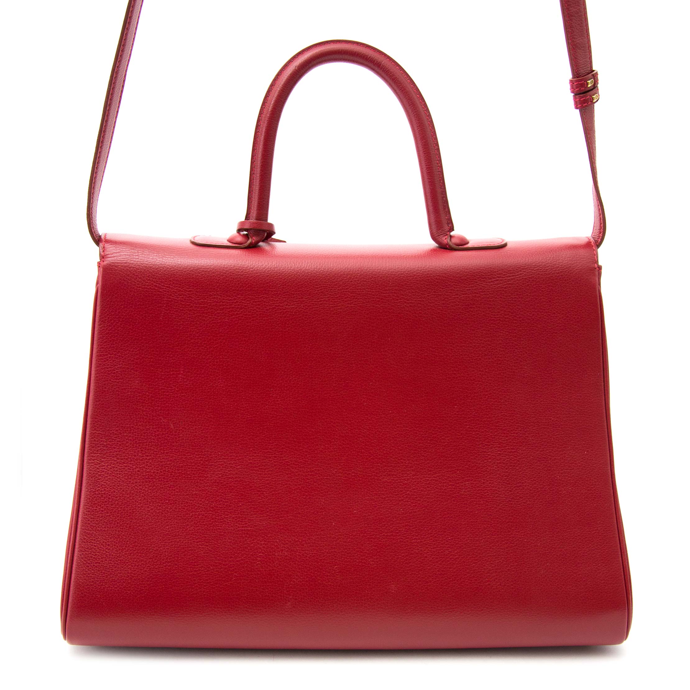 LABELLOV - Make heads turn with this stunning vibrant red Delvaux
